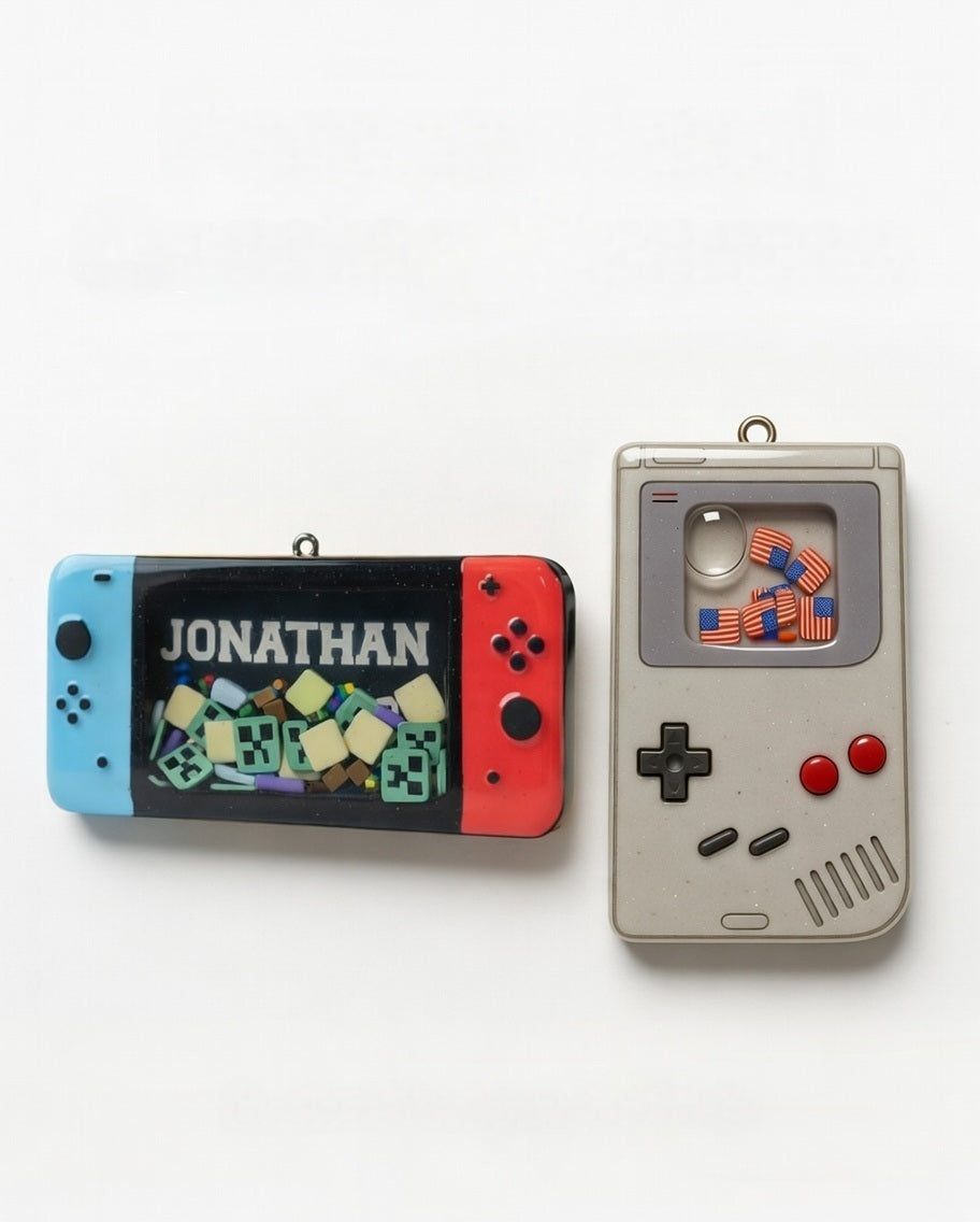 Shaker keychains that look like handheld video game consoles and contain glitter and pearls that float around inside.